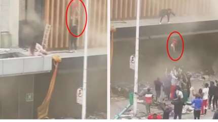 Kan donduran olay: Yanan binadan çocuğunu aşağı attı!