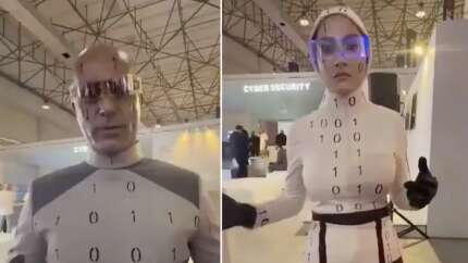 İran'ın robot fiyaskosu: Teknoloji fuarında sergilenen insansı robotların insan olduğu ortaya çıktı!
